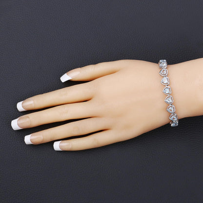 Heart Blue Topaz Prong Silver Tennis Bracelet