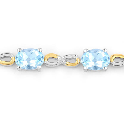 Oval Blue Topaz Prong Silver Infinity Bolo Adjustable Bracelet