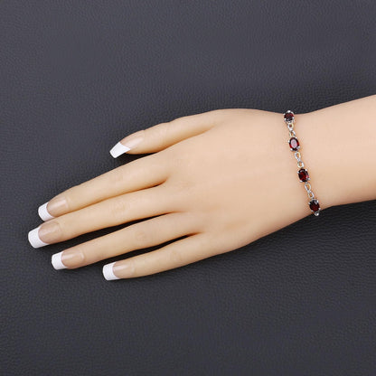 Oval Deep Red Garnet Prong Two-Tone Gold Plated Silver Infinity Bolo Adjustable Bracelet
