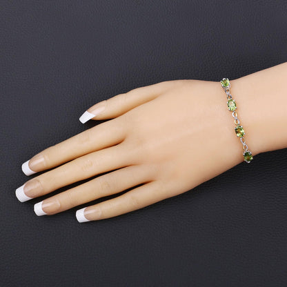 Oval Green Peridot Prong Two-Tone Gold Plated Silver Infinity Bolo Adjustable Bracelet