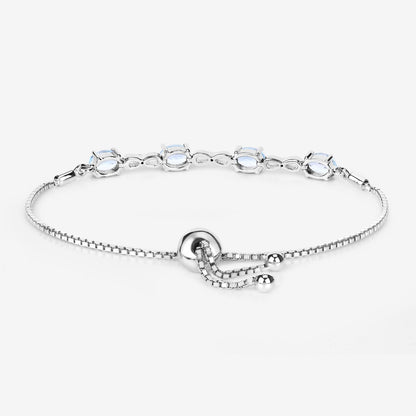 Oval Blue Topaz Prong Silver Infinity Bolo Adjustable Bracelet