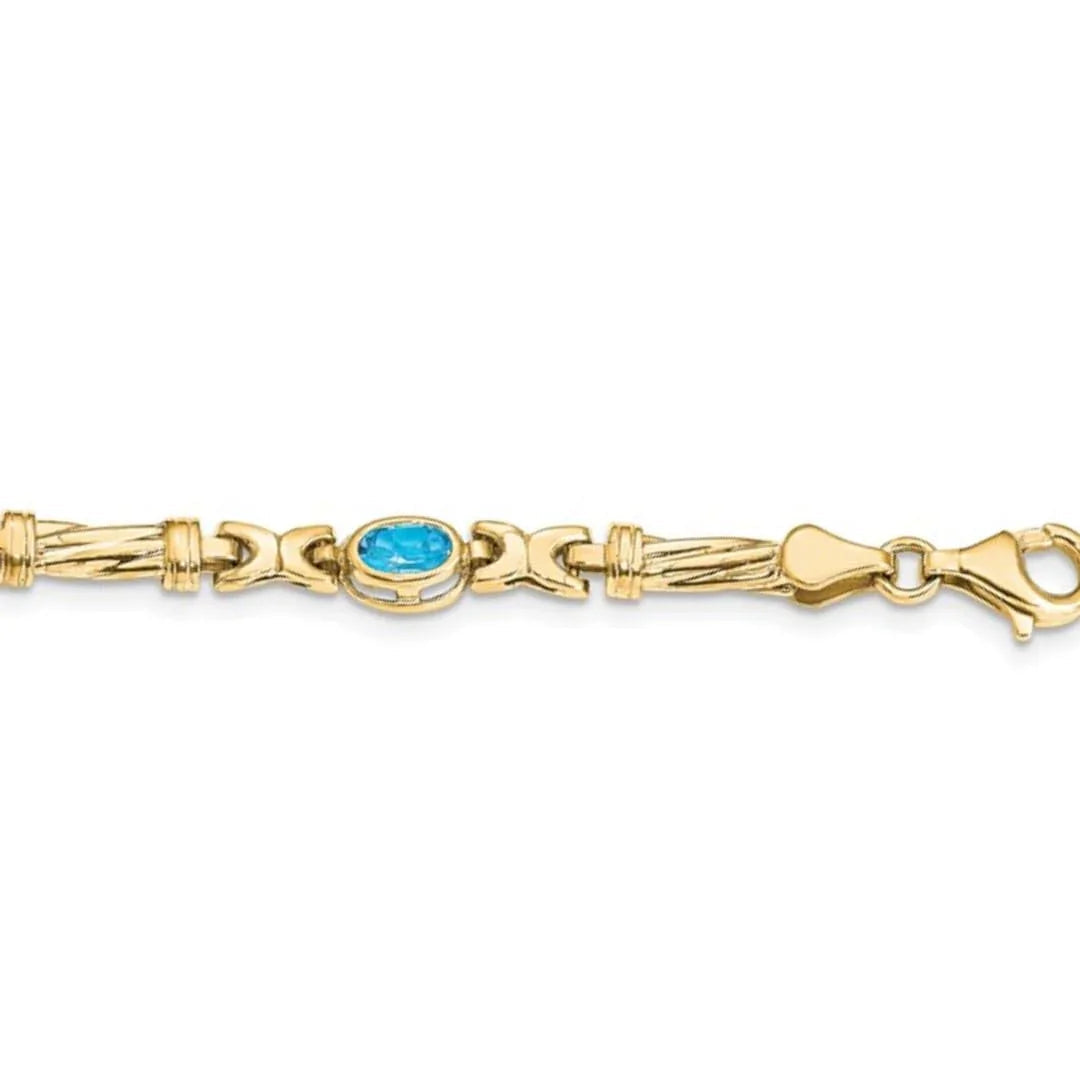 Oval Swiss Blue Topaz Bezel 10K Yellow Gold Fancy Link Bracelet