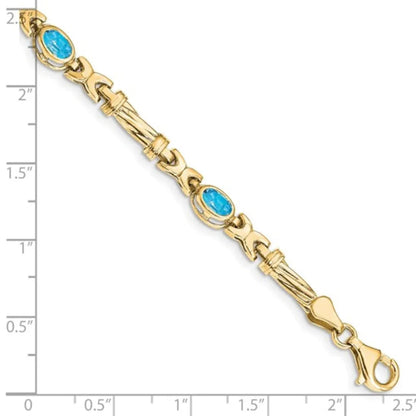 Oval Swiss Blue Topaz Bezel 10K Yellow Gold Fancy Link Bracelet