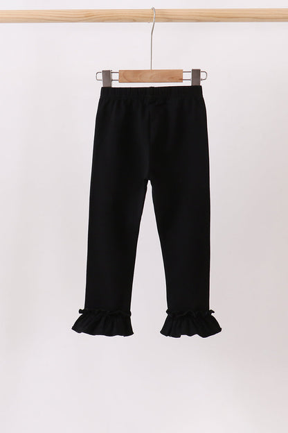 Black ruffle pants