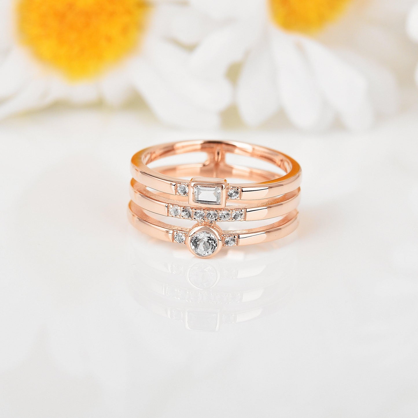 0.35 Ct Round White Sapphire and White Topaz Flush Silver Three Band Ring