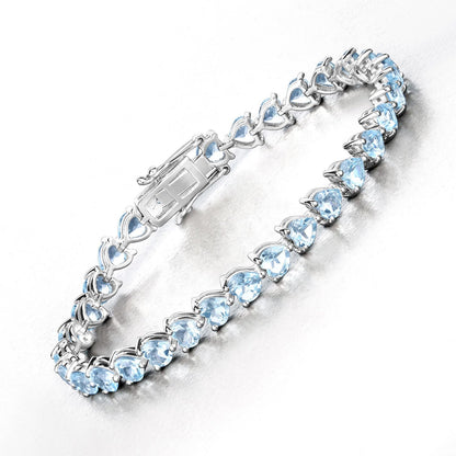 Heart Sky Blue Topaz Prong Silver Tennis Bracelet