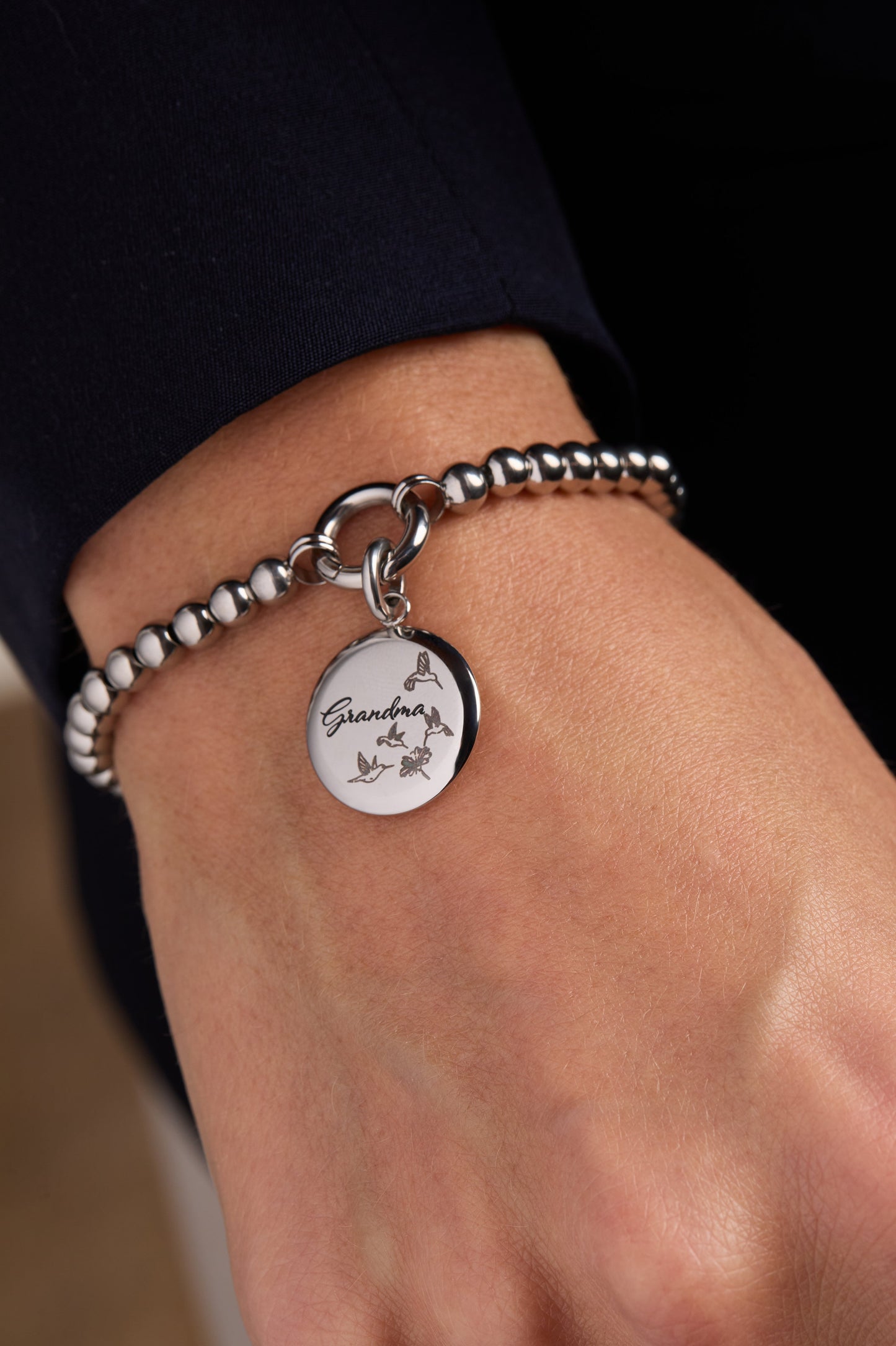 Grandma Hummingbird Disc Charm