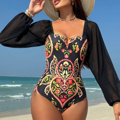 Long sleeved mesh one-piece swimsuit for women