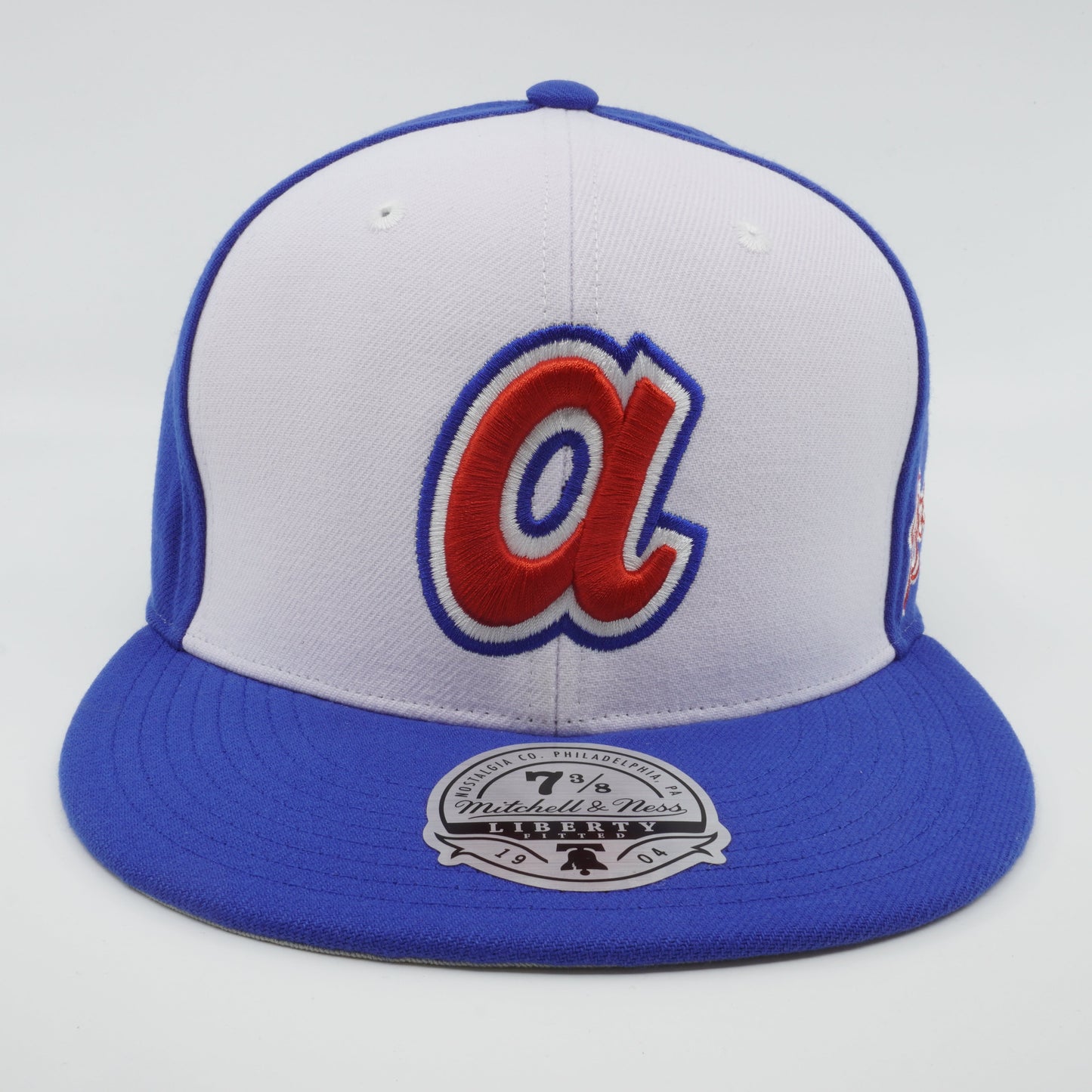 Mitchell & Ness Men's MLB Evergreen Fitted Coop Braves Fitted Caps
