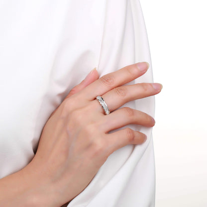 White Topaz Baguette Ring with Round Accents
