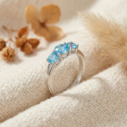 0.55 Ct Round Natural Blue Paraiba Apatite Prong Rhodium Silver Three Stone Ring