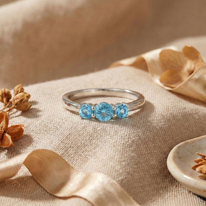 0.55 Ct Round Natural Blue Paraiba Apatite Prong Rhodium Silver Three Stone Ring