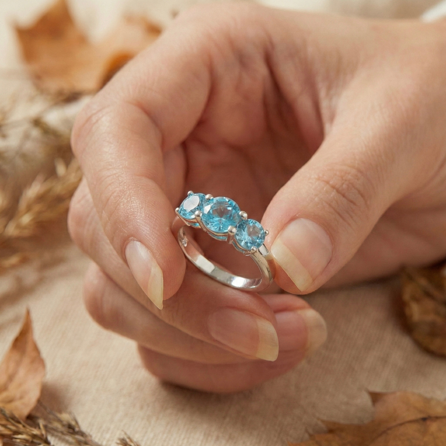 0.55 Ct Round Natural Blue Paraiba Apatite Prong Rhodium Silver Three Stone Ring