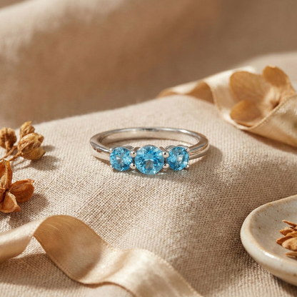 0.55 Ct Round Natural Blue Paraiba Apatite Prong Rhodium Silver Three Stone Ring