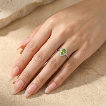 0.97 Ct Pear Green Peridot and Moissanite Prong Silver Halo Engagement Ring