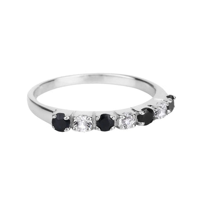 0.56 Ct Round Black Sapphire and White Topaz Prong Silver Half Eternity Ring