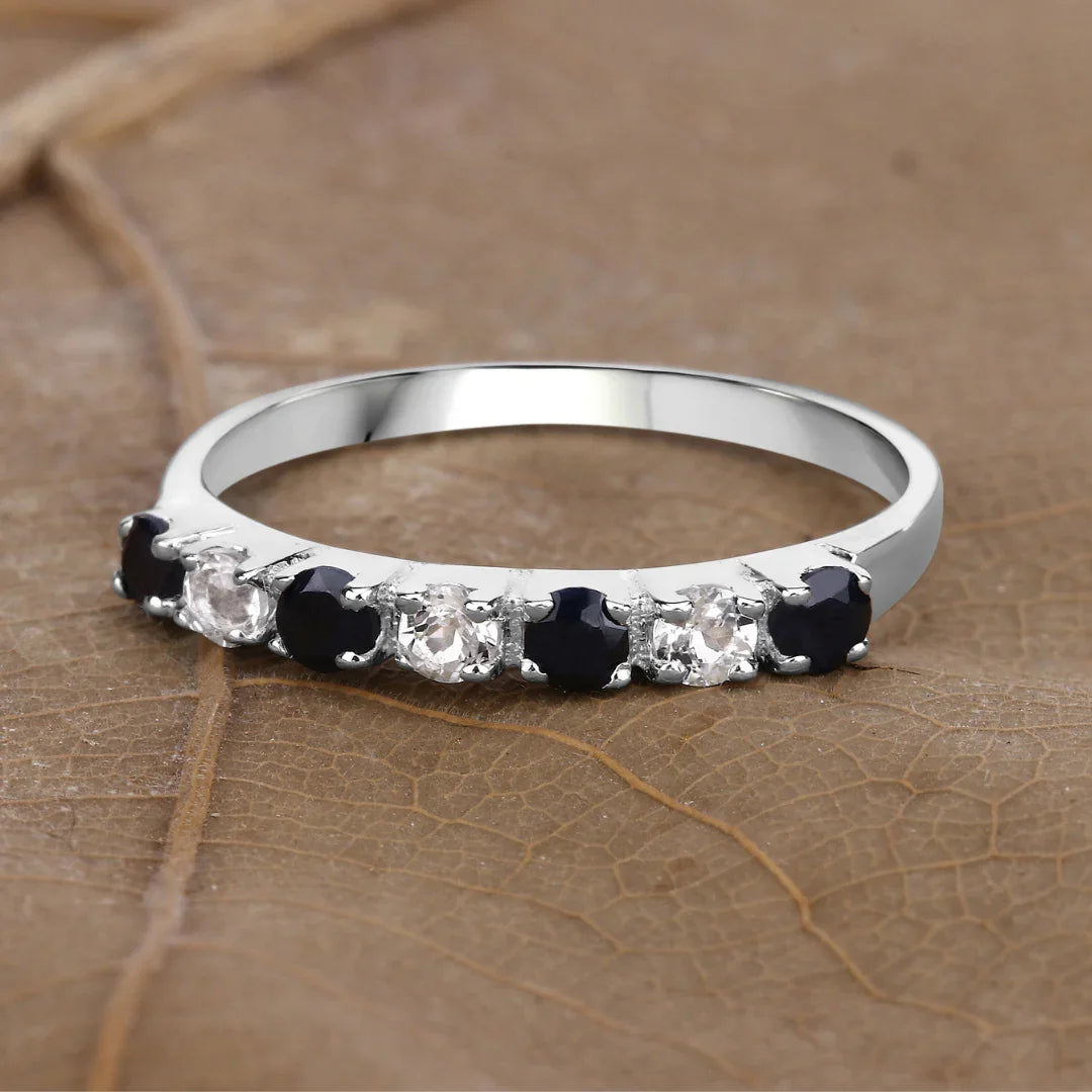 0.56 Ct Round Black Sapphire and White Topaz Prong Silver Half Eternity Ring