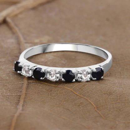 0.56 Ct Round Black Sapphire and White Topaz Prong Silver Half Eternity Ring