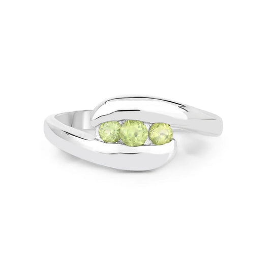 0.56 Ct Oval Green Peridot Channel Silver Three Stone Bypass Ring