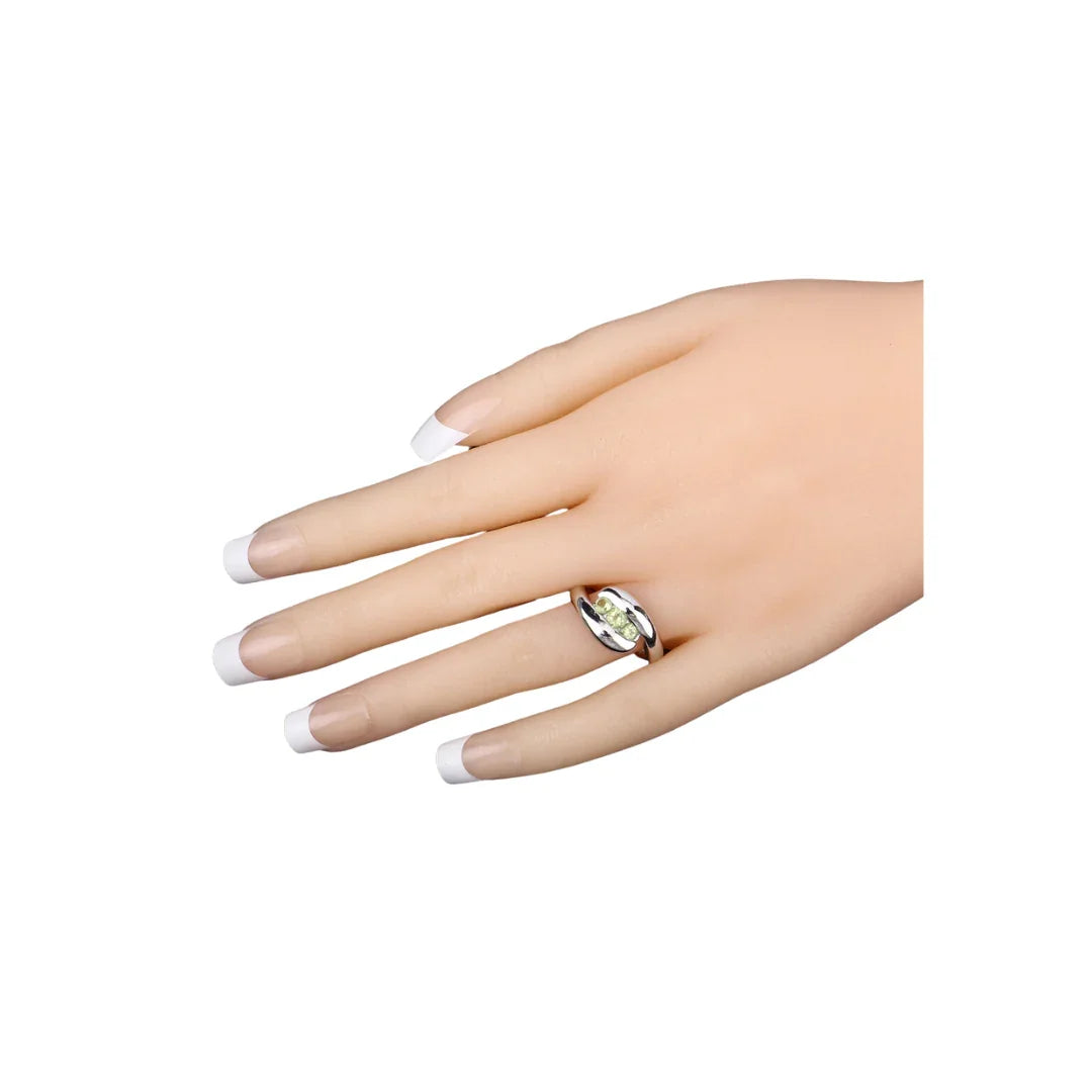 0.56 Ct Oval Green Peridot Channel Silver Three Stone Bypass Ring