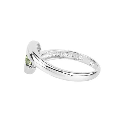 0.56 Ct Oval Green Peridot Channel Silver Three Stone Bypass Ring