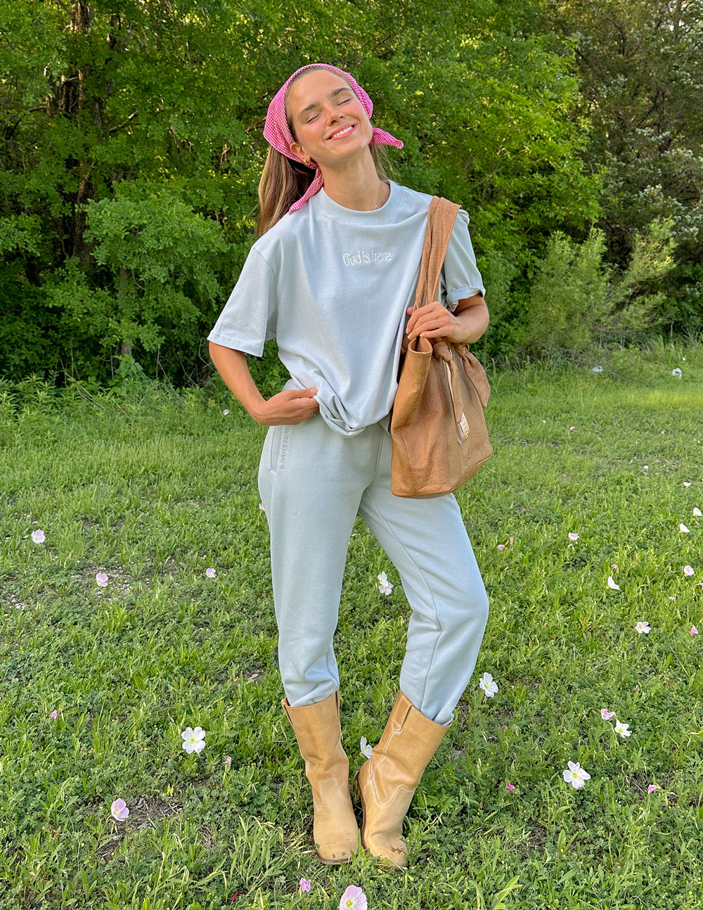 Elevated Faith God Is Here Unisex Tee