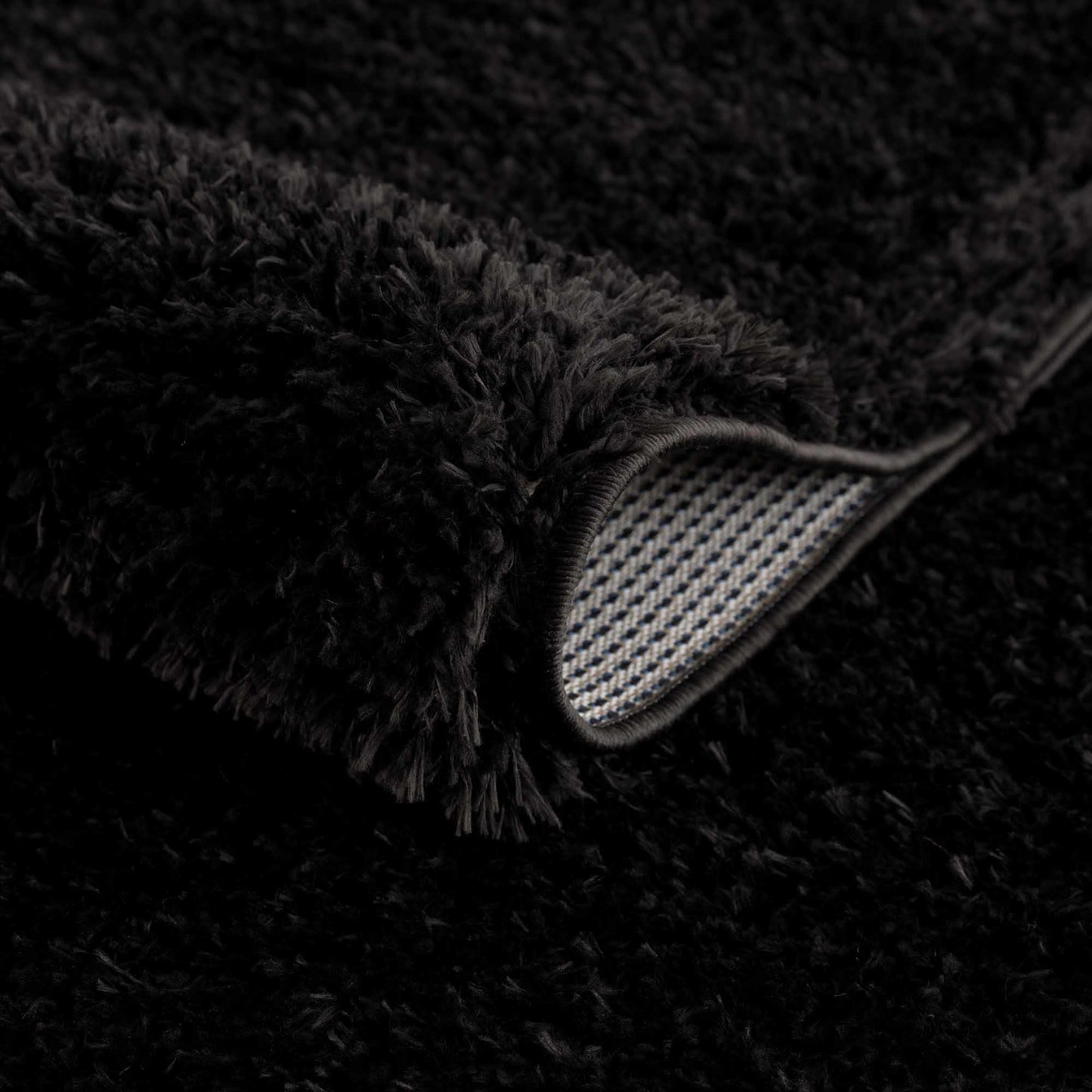Faina Solid Black Shag Washable Area Rug