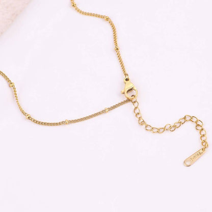 Mint & Lily Mother Of Pearl Heart Initial Necklace
