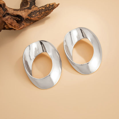 Silvertone Open Oval Statement Earrings