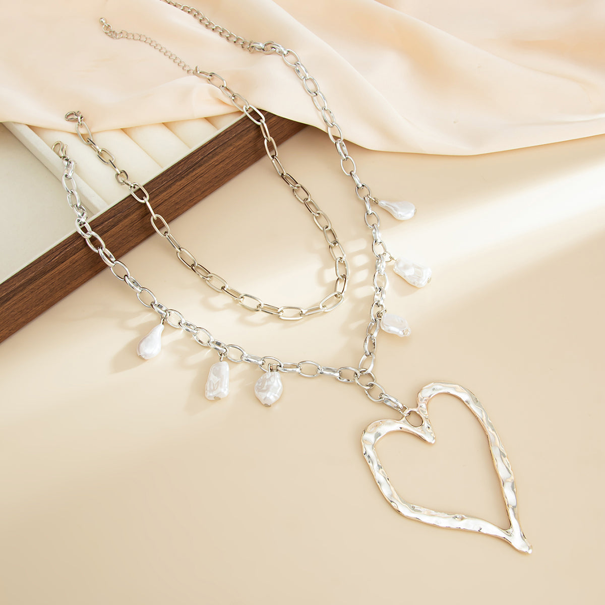 Pearl & Silvertone Open Heart Pendant Statement Necklace