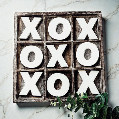 handmade wooden tic tac toe board game decor
rustic wood tic tac toe coffee table game
farmhouse style x and o tabletop decoration
neutral wooden tic tac toe set for living room
square 12x12 wooden tic tac toe board with pieces