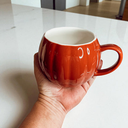 Handmade autumn pumpkin coffee cups - seasonal kitchen decor accessories
Morning coffee pumpkin mugs - fall kitchen essentials in ceramic white and orange