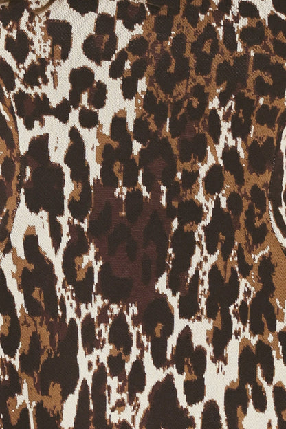 Wildly Polished Leopard Peplum Sweater Top