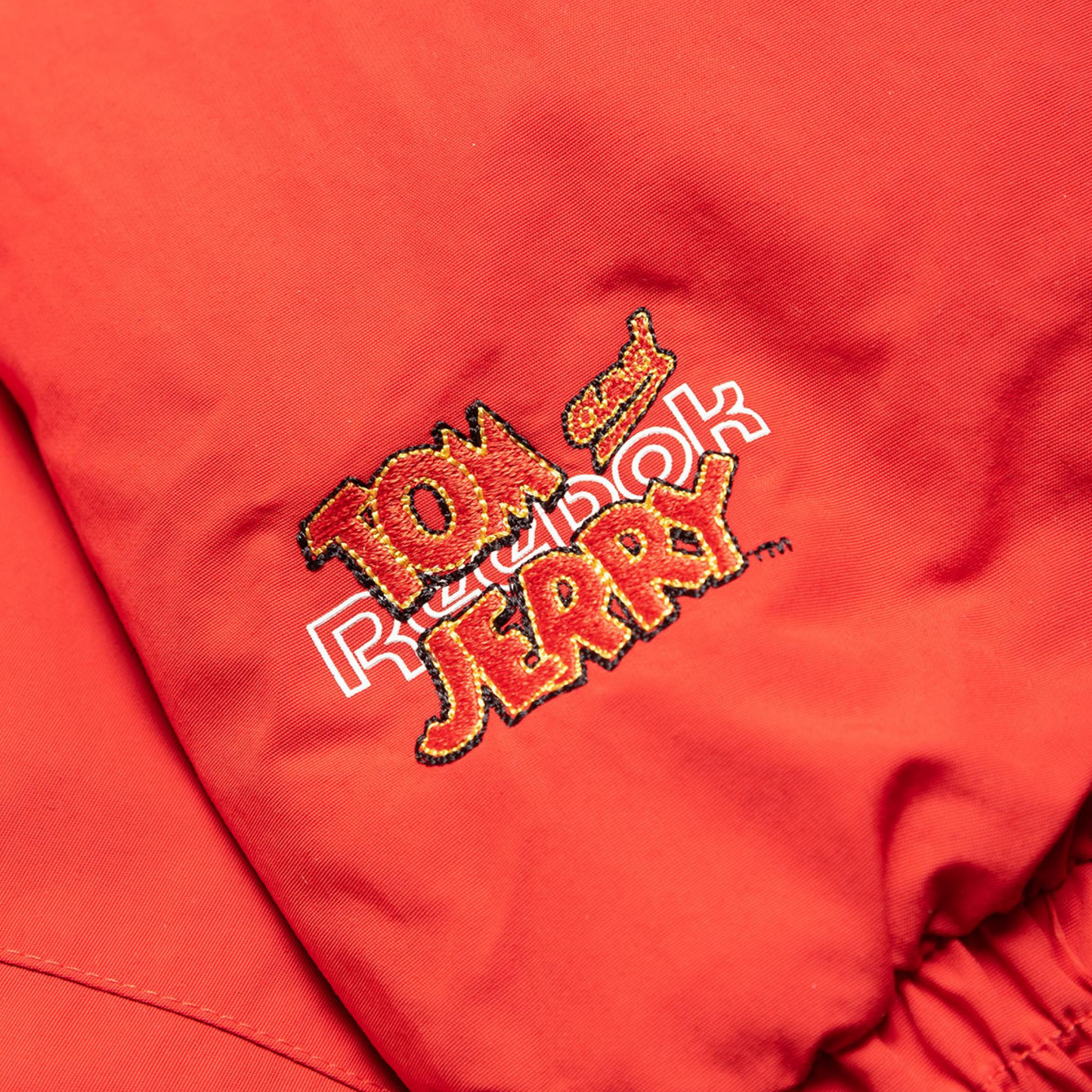 Reebok Men's Tom & Jerry Woven Jacket