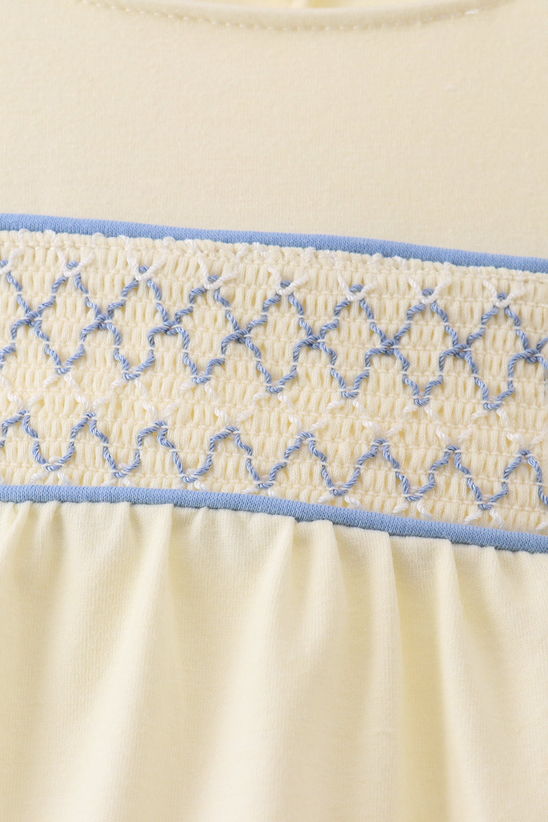 Cream smocked bubble