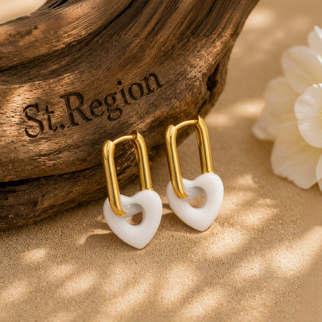 White & Goldtone Heart Huggie Earrings