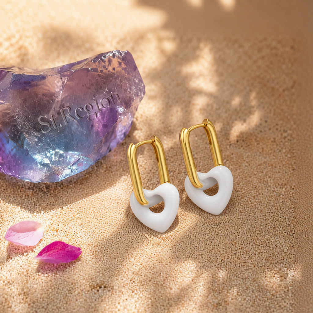 White & Goldtone Heart Huggie Earrings