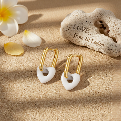 White & Goldtone Heart Huggie Earrings