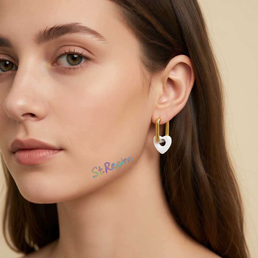 White & Goldtone Heart Huggie Earrings