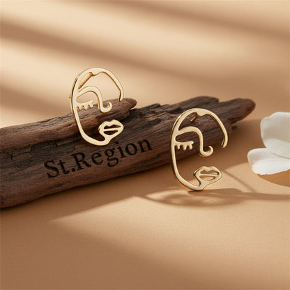 Goldtone Abstract Face Stud Earrings