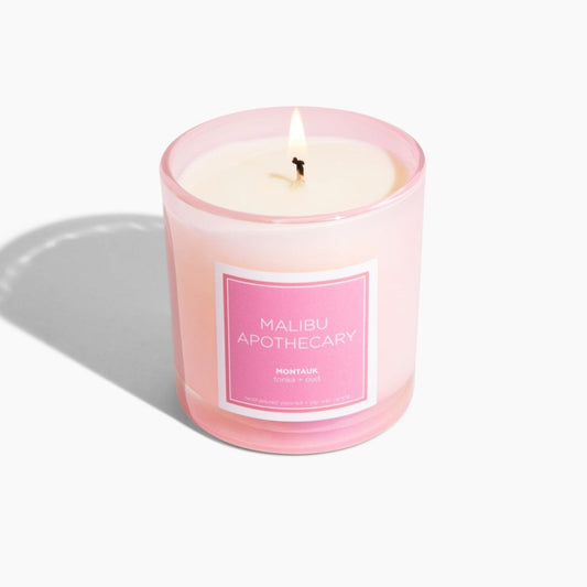 iridescent pink candle with all natural coconut and soy wax burning clean