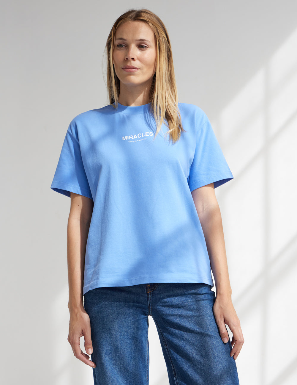 Elevated Faith Miracles Blue Unisex Tee