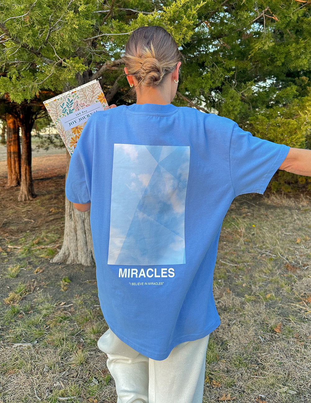 Elevated Faith Miracles Blue Unisex Tee