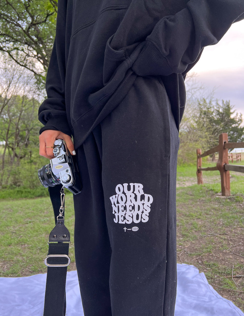 Elevated Faith Our World Needs Jesus Black Unisex Sweatpant