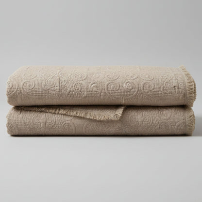 DaDa Bedding Elegant Fringed Cotton Quilted Throw Blanket - Luxurious Solid Soft Paisley Pattern, Cozy Lightweight Lap Throw, Perfect for Couch or Bed, Neutral Sandy Taupe Tan Beige, 50x60 Inches