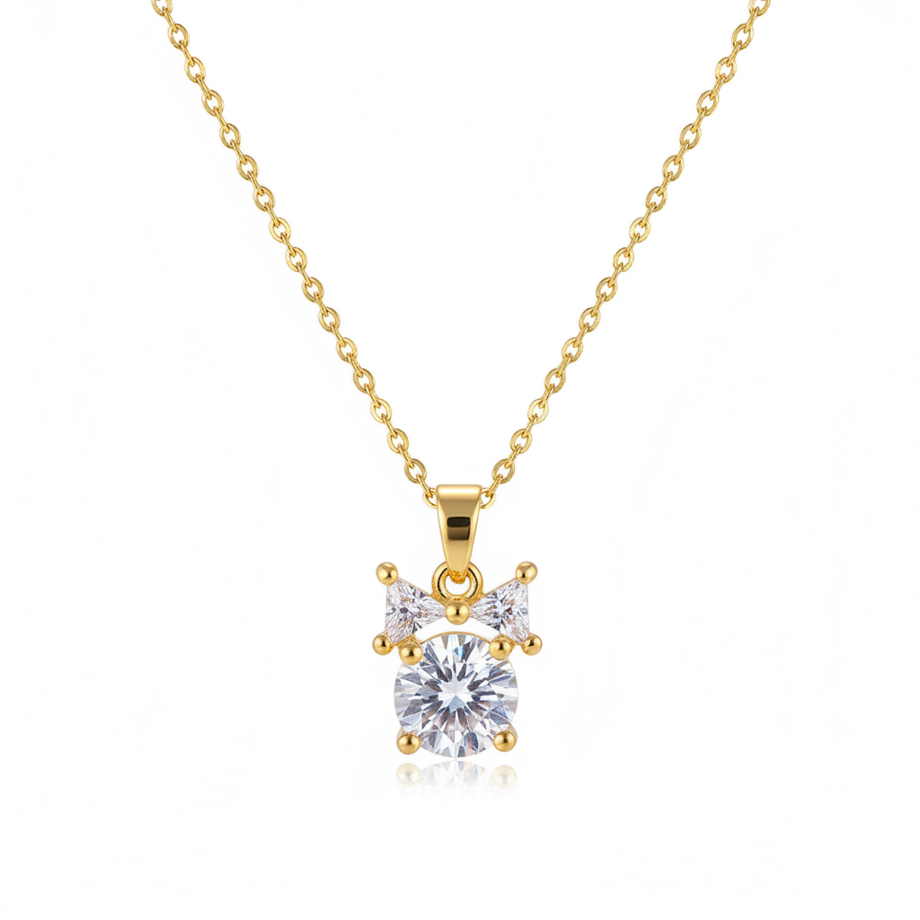 Clear Crystal & Goldtone Bow Pendant Necklace