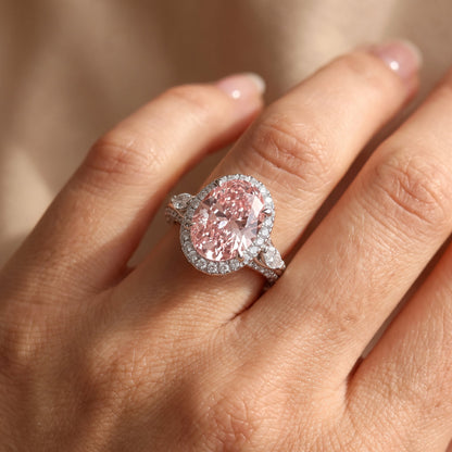3Cttw Oval Shaped Pink Lab Grown Diamond (F/VS) Three Stone Halo Engagement Ring in 14K Gold