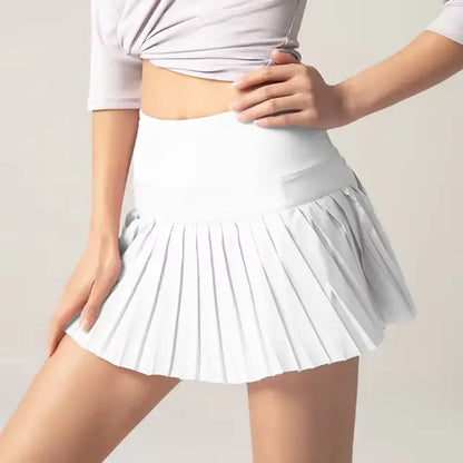 Onyx Flow Pleated Athletic Skirt – Built-In Shorts & Pockets