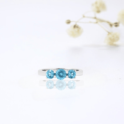 0.55 Ct Round Natural Blue Paraiba Apatite Prong Rhodium Silver Three Stone Ring