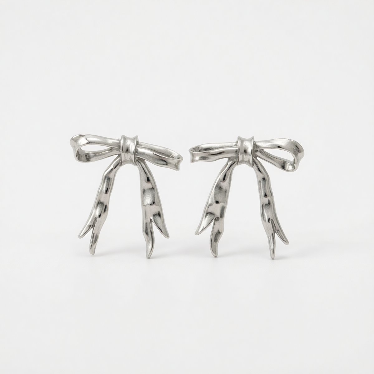 Silvertone Hammered Bow Stud Earrings